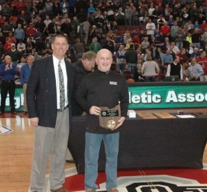 Coach Smith receiving 300th win award